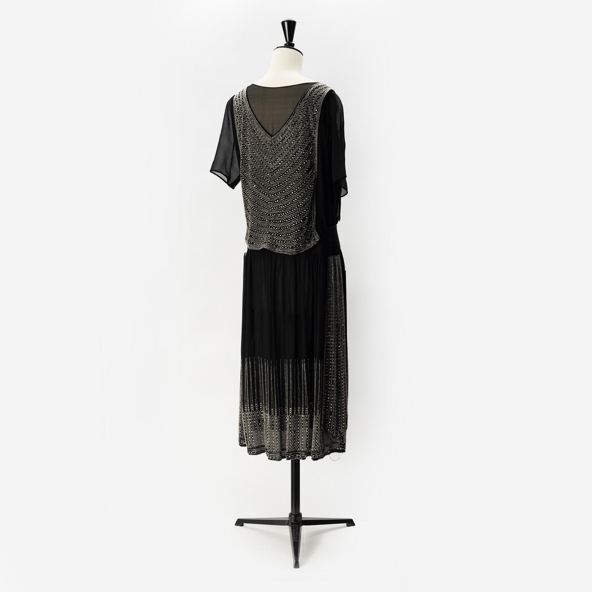 A 1920's pearl embroidered dress.