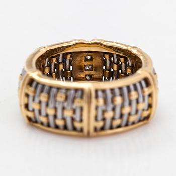 Cartier,an 18K gold and steel ring, with brilliant-cut diamonds.