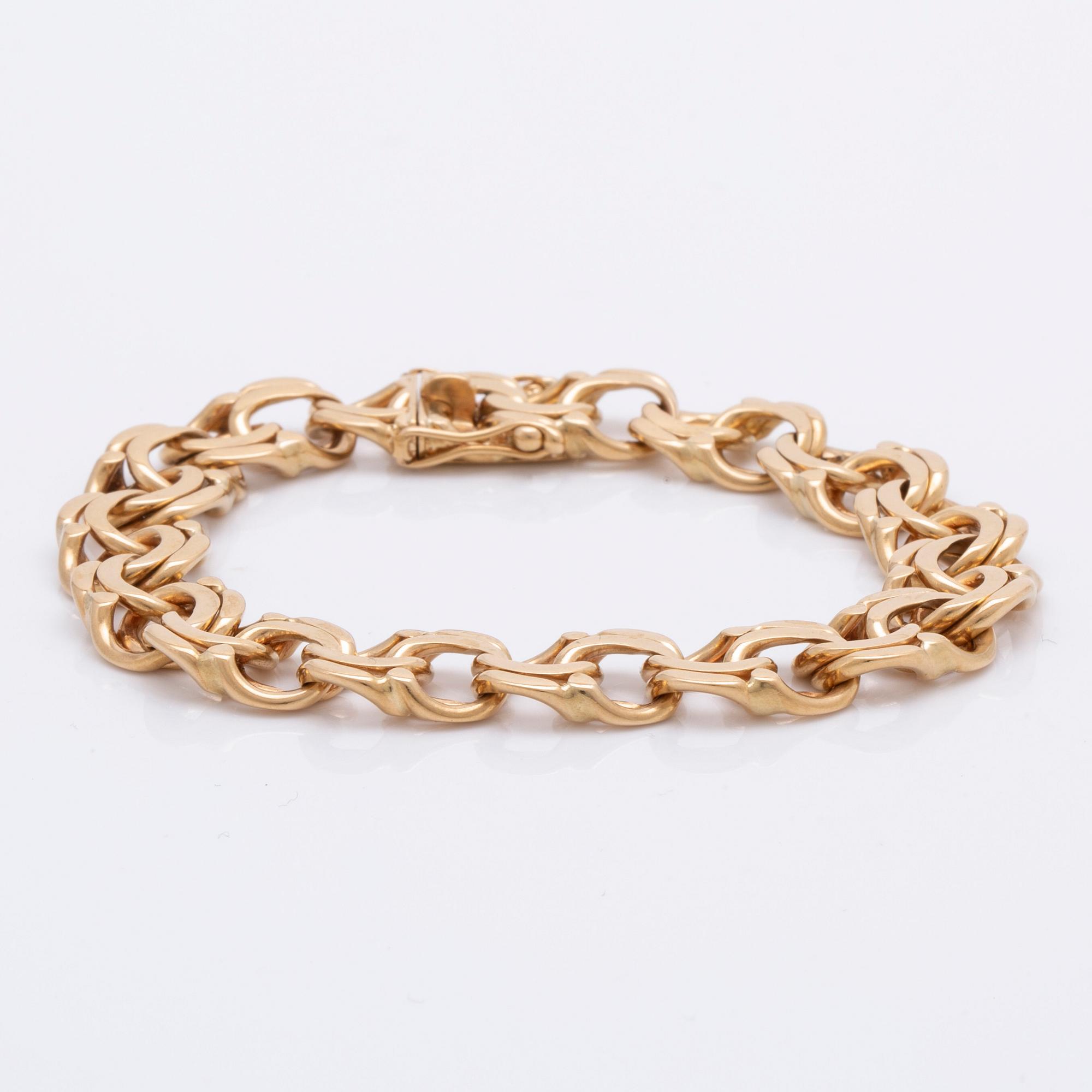 Armband 18K guld bismarck-länk, 38,5 g, ca 18 x 1 cm.