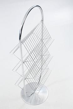 A magazine rack from the series System-1-2-3", designed by Verner Panton for Fritz Hansen around 1973.