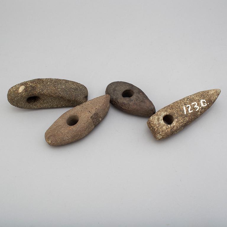 Four late neolithic stone axes.