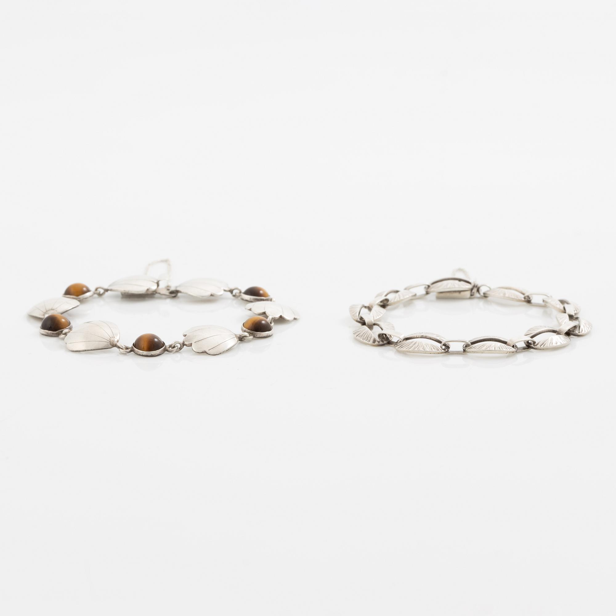 Victor Janson, two silver bracelets, one set with tiger's eye.