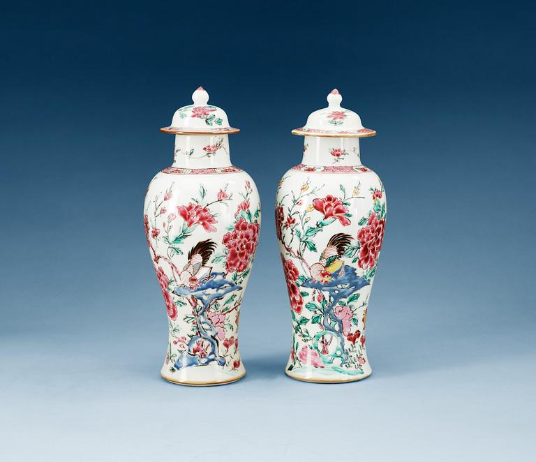 A pair of famille rose 'rooster' vases with covers, Qing dynasty, Qianlong (1736-95).