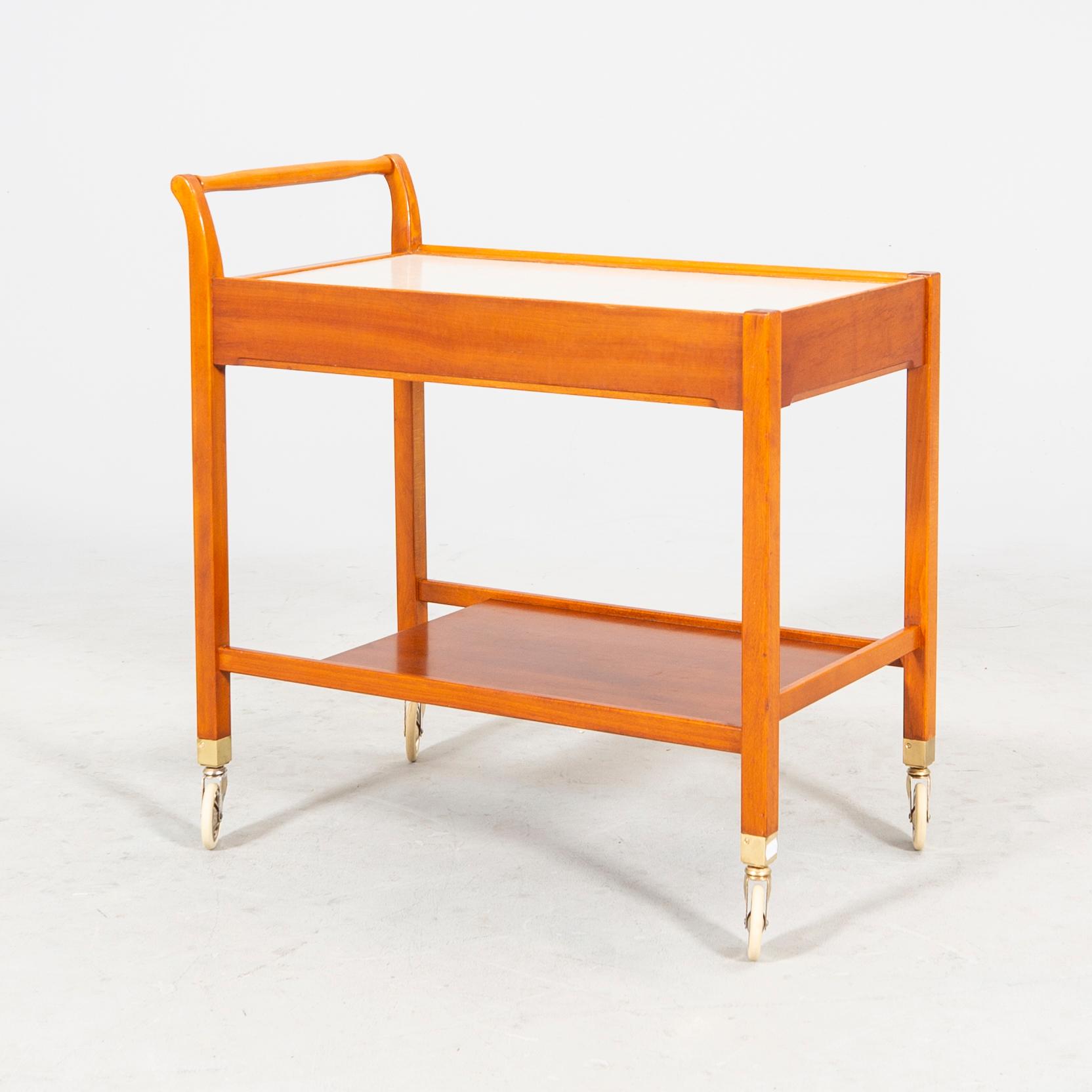 A beech and laminate 'Triva' drinks trolley from Nordiska Kompaniet 1949.