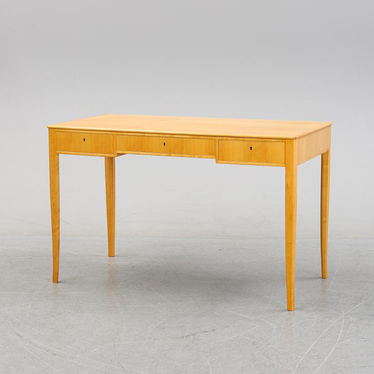 A 'Nya guldheden' desk by Carl Malmsten.