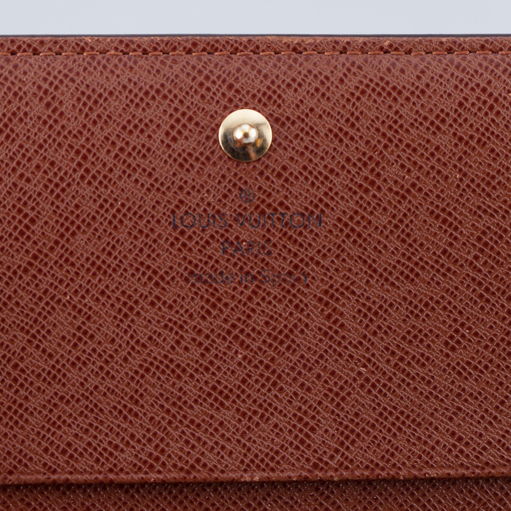 LOUIS VUITTON, a monogram canvas wallet.