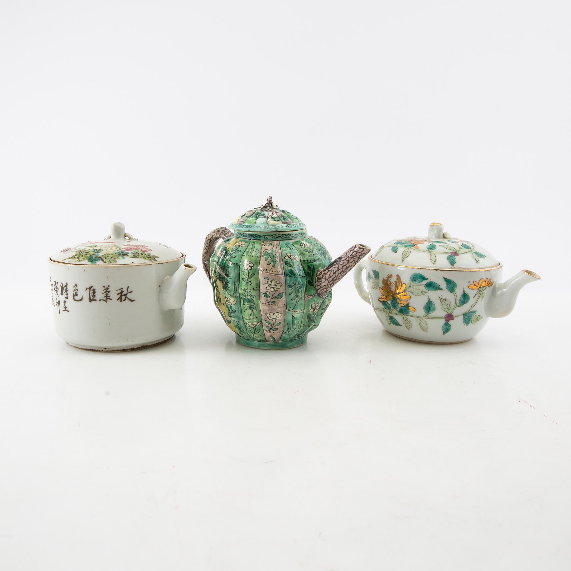 A set of three differently decorated tea pots with covers, Qing dynasty, 18century and 20th century.