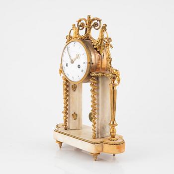 A Louis XVI marble and ormolu portico clock, the dial signed Bouchet, late 18th century.