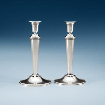 635. A pair of Atelier Borgila sterling candlestick,