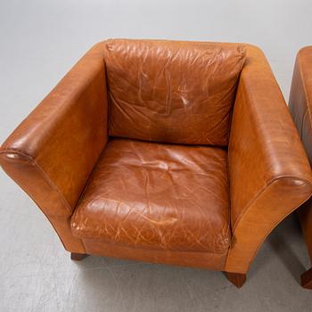 A pair of Lederland leather armchairs Netherlands later part of the 20th century.