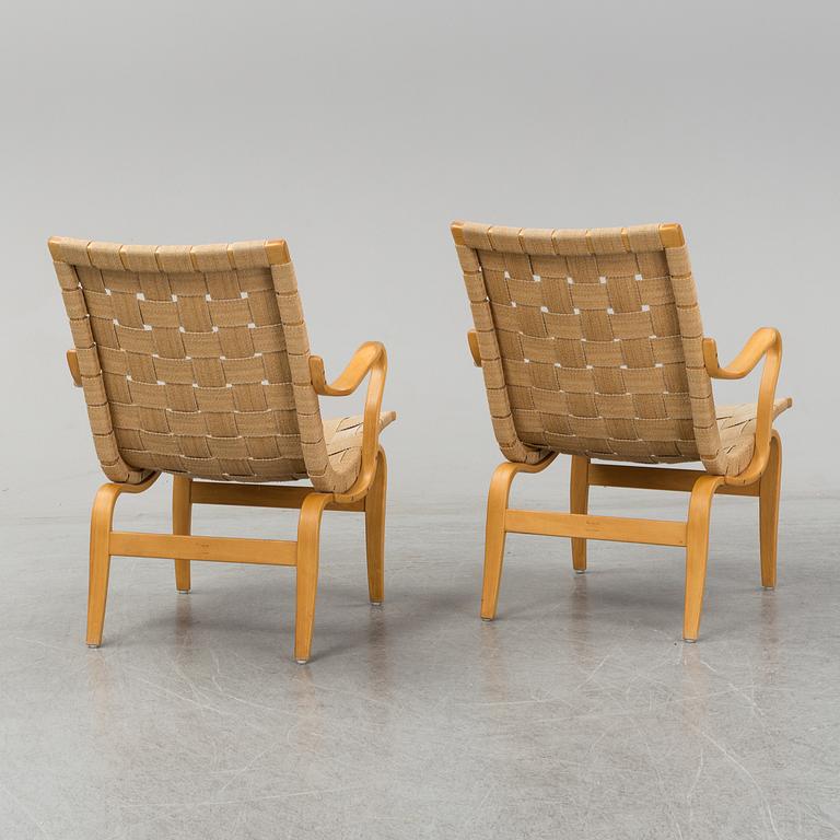 A pair of 'Eva' easy chairs by Bruno Mathsson, Firma Karl Mathsson, Värnamo 1973.