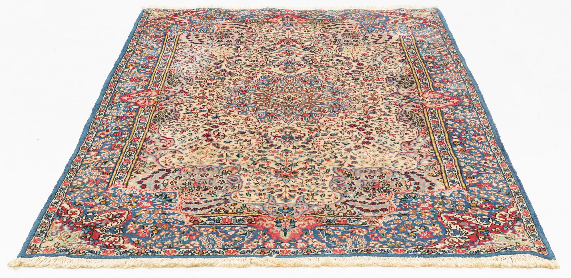 A rug, Kerman, ca 230 x 145 cm.