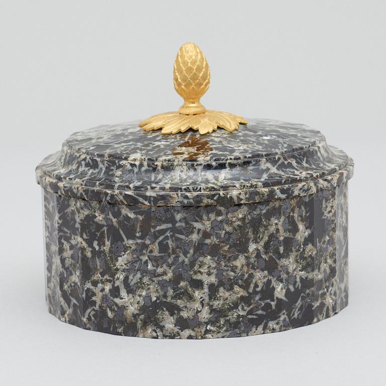 A Swedish Empire 19th century aglomerat stone butter box.