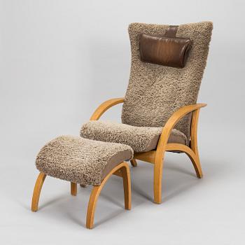 A 'Delta Adventure' armchair with ottoman, Brunstad, Norway.