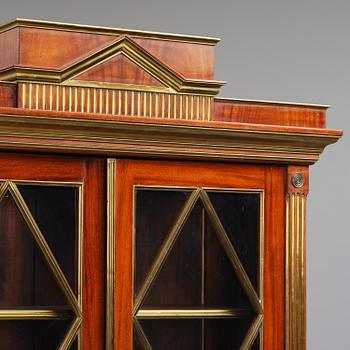 A pair of Russian mahogany and brass-mounted Jacob-style bibliothèques, modern with old parts.