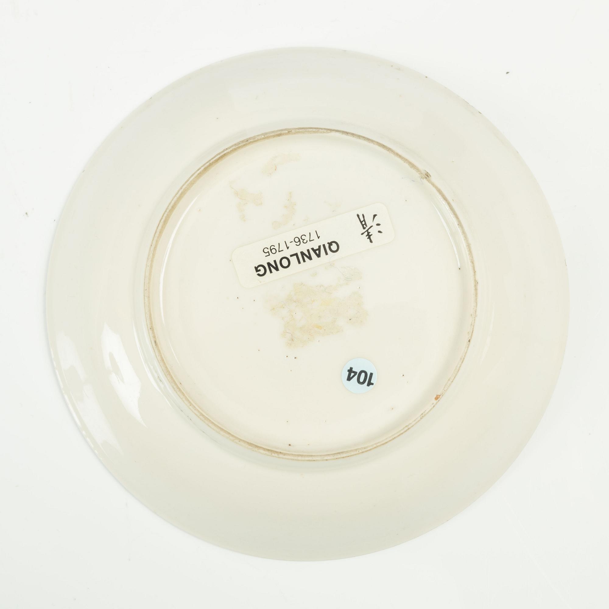 A Chinese soft paste cup with saucer, Qing dynasty, 18th century.