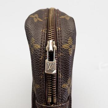 A Louis Vuitton toiletry bag.