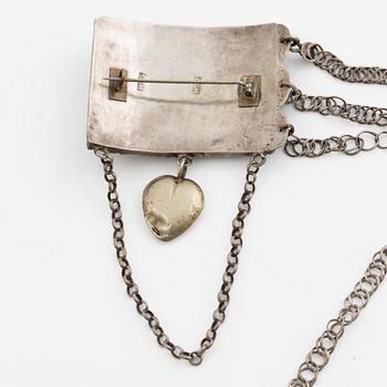 Folk costume jewellery, silver with glass stones.