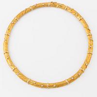 Collier, Lapponia, "Torsade", Christophe Burger, 18K guld med briljantslipade diamanter, totalt 0.63 ct.