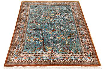 An all silk oriental carpet, a. 280 x 185 cm.