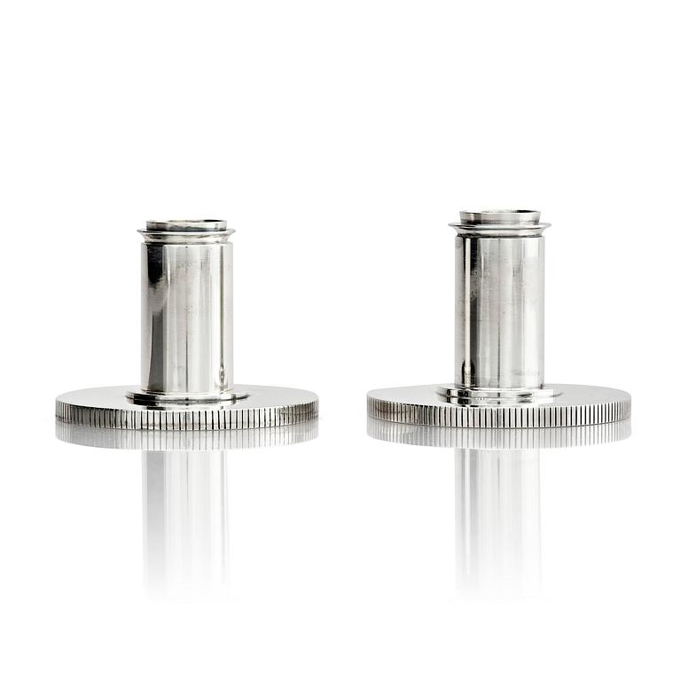 Georg Jensen, a pair of sterling silver candlesticks, design by Sigvard Bernadotte, model no 711A, Copenhagen, Denm after 1945.