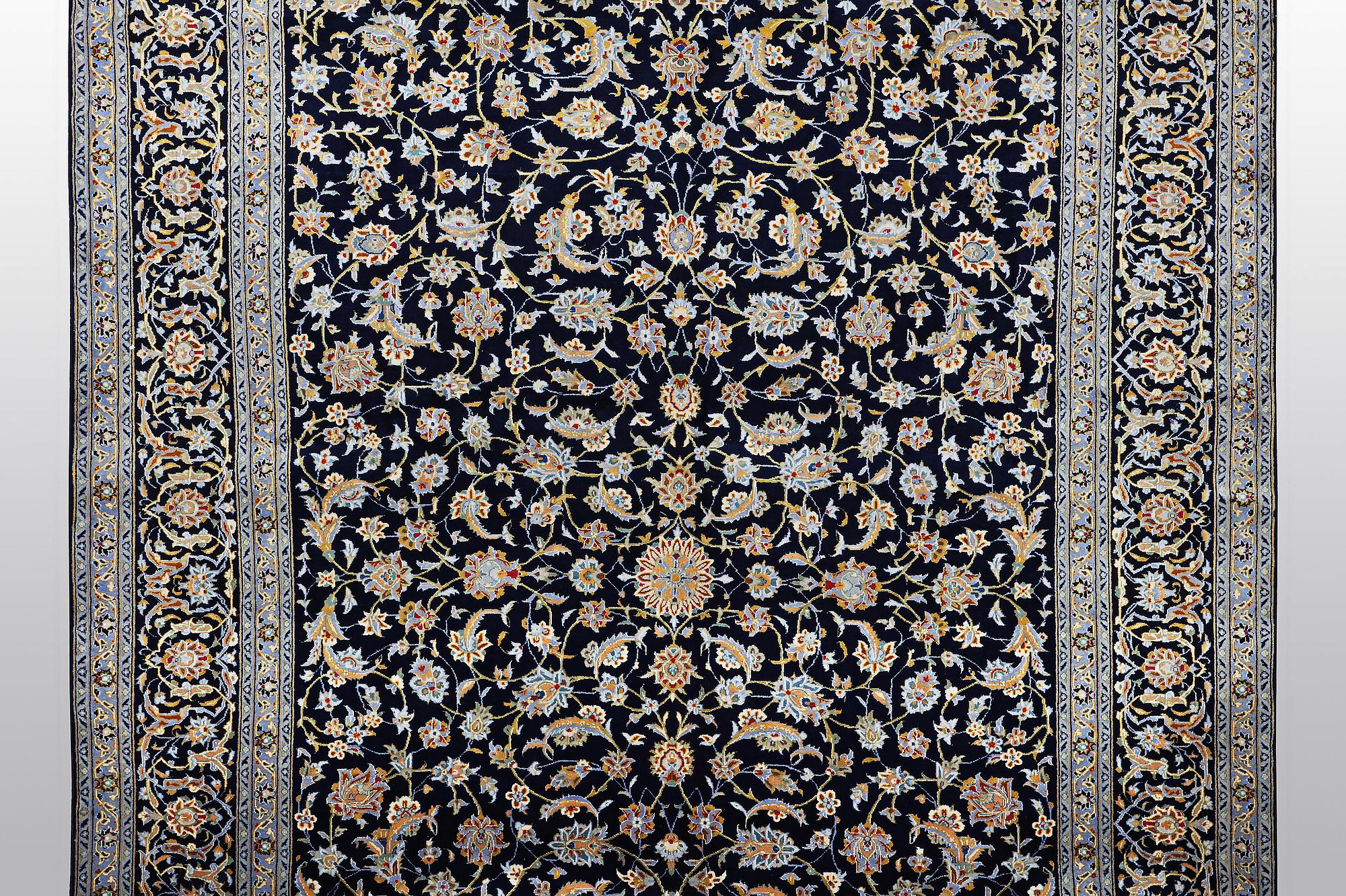 A carpet, Kashan, ca 416 x 304 cm.