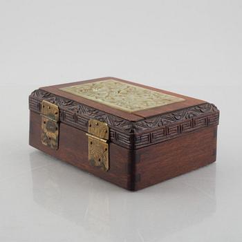 Two Chinese hardwood boxes with nephrite plaques, 20th century.