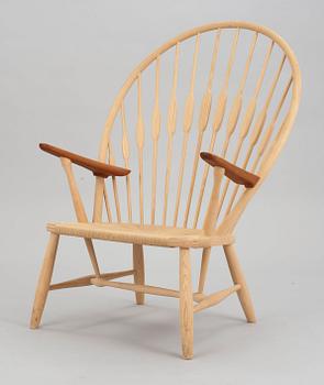 A Hans J Wegner ash and teak 'Peacock chair', by PP Møbler, Denmark.