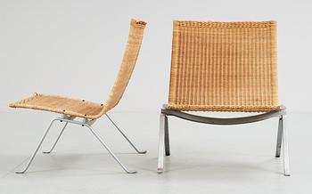 A pair of Poul Kjaerholm 'PK-22' steel and ratten easy chairs, E Kold Christensen, Denmark, maker's mark in the steel.