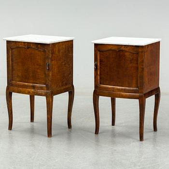 A pair of bedside tables, early 20th century.