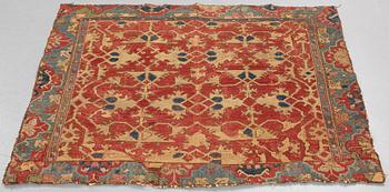 A CARPET FRAGMENT, an antique Western Anatolian "Lotto", 17th century, ca 105 x 125 cm.