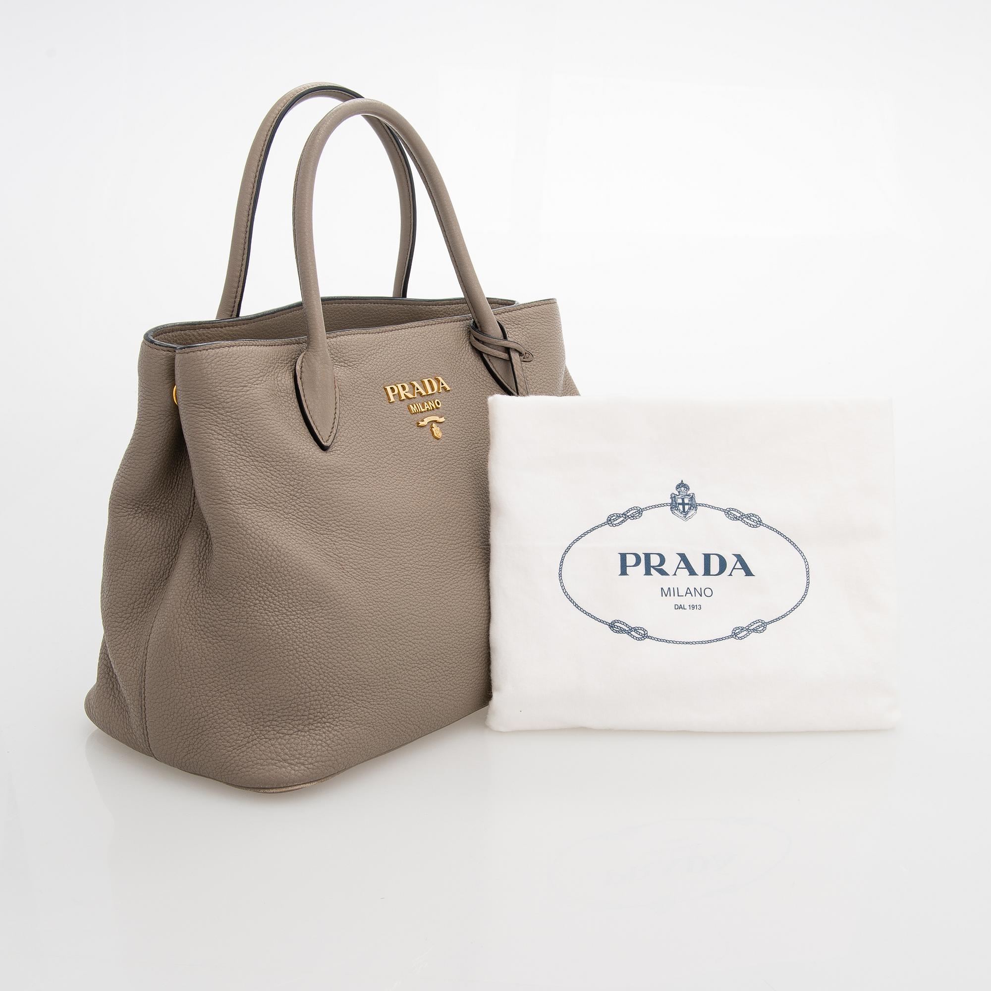Prada, a clay gray leather handbag, 2020.