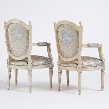 A pair of carved Gustavian chairs by J. Mansnerus (master 1756-1779).