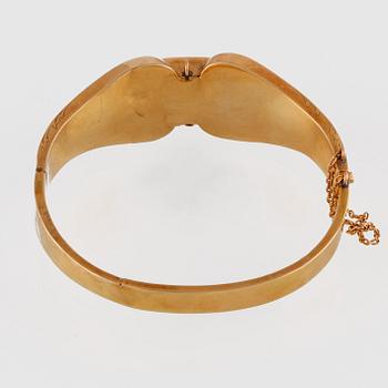ARMBAND, 18K guld samt blå emalj, franska stämplar, 1800-tal. Vikt 20,2 gram.