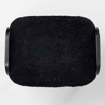 Yngve Ekström, a 'Lamino' easy chair with foot stool, Swedese 2010.