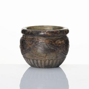 A well sculptured 'chrysanthemum' stone flowerpot, late Ming/early Qing dynasty.