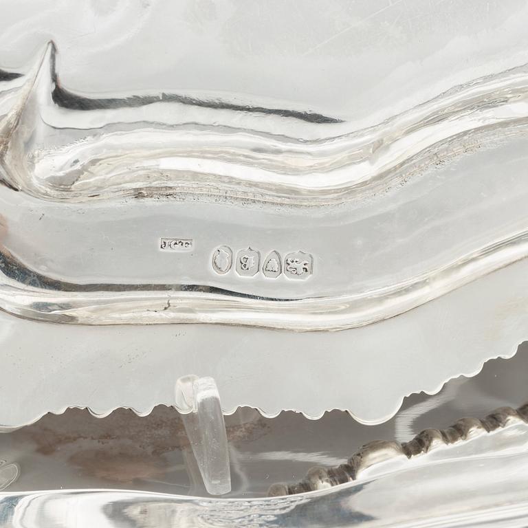 An English set of 4 x 2 silver plates, mark of Burwash & Sibley, E. Farrell, J.C. Edington London 1806-1837. (8).