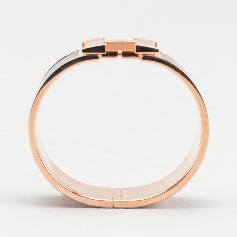 A Hermès "Clic-H" bracelet.