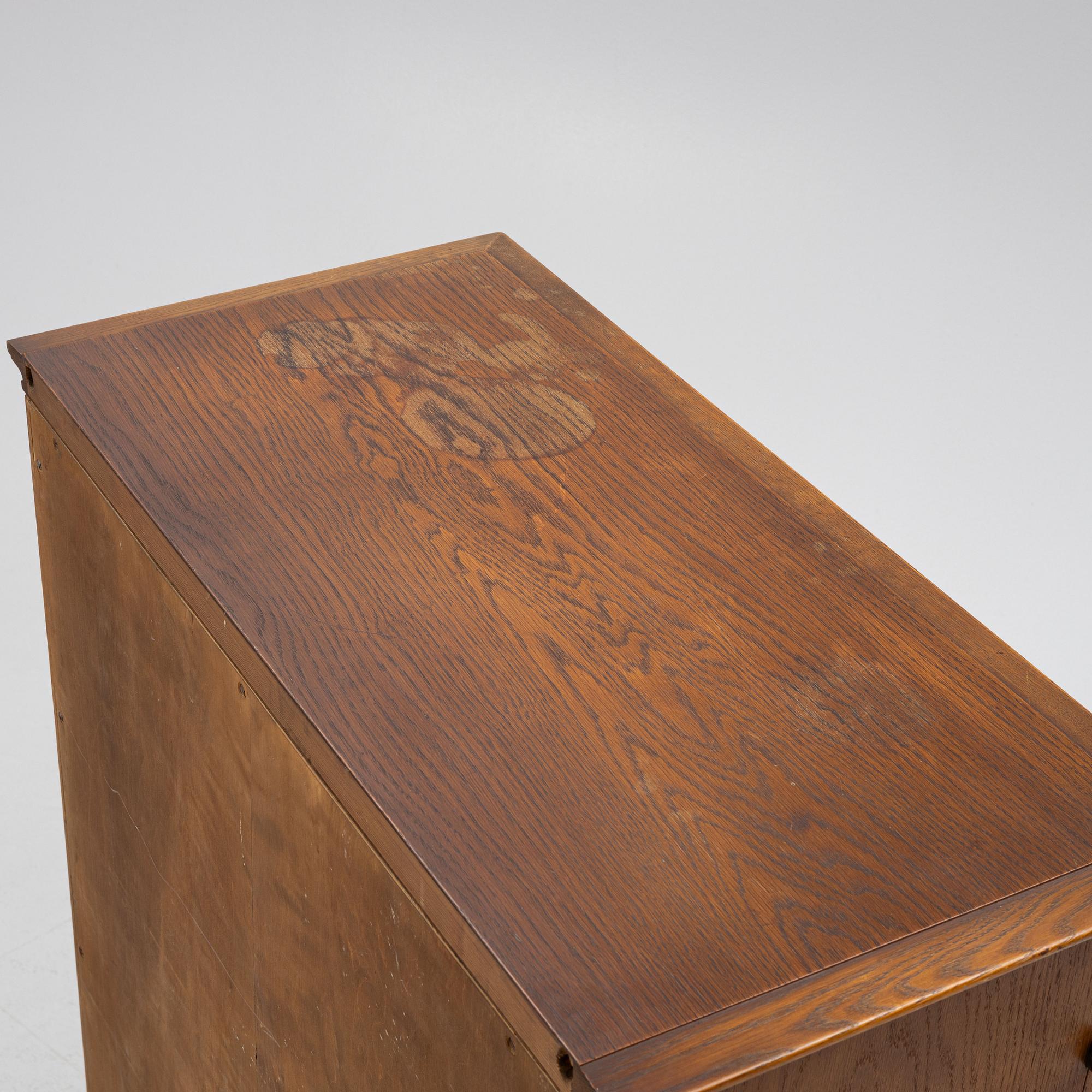 Oscar Nilsson, attributed to, a Swedish Modern oak cabinet, likely executed by Åfors Möbelfabrik, 1940s.