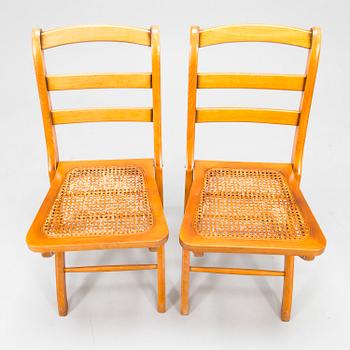 A pair of French folding chairs, Grange, latter half of the 20th century.