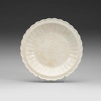 230. A white glazed ding yao dish, Song Dynasty (960-1279).