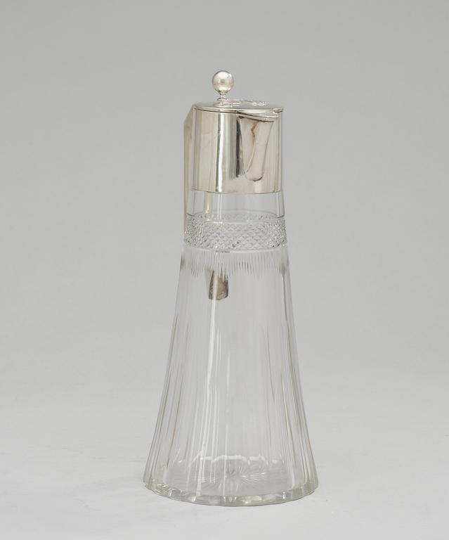 A glass and silver jug, Austria 1901-1921.