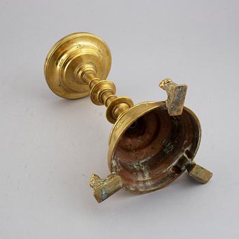 A 19th century bronze candlestick.