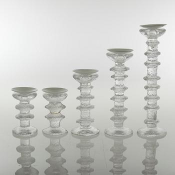 Five glass candlesticks by Timo Sarpaneva for Iittala, model "Festivo", second half of the 20th century.
