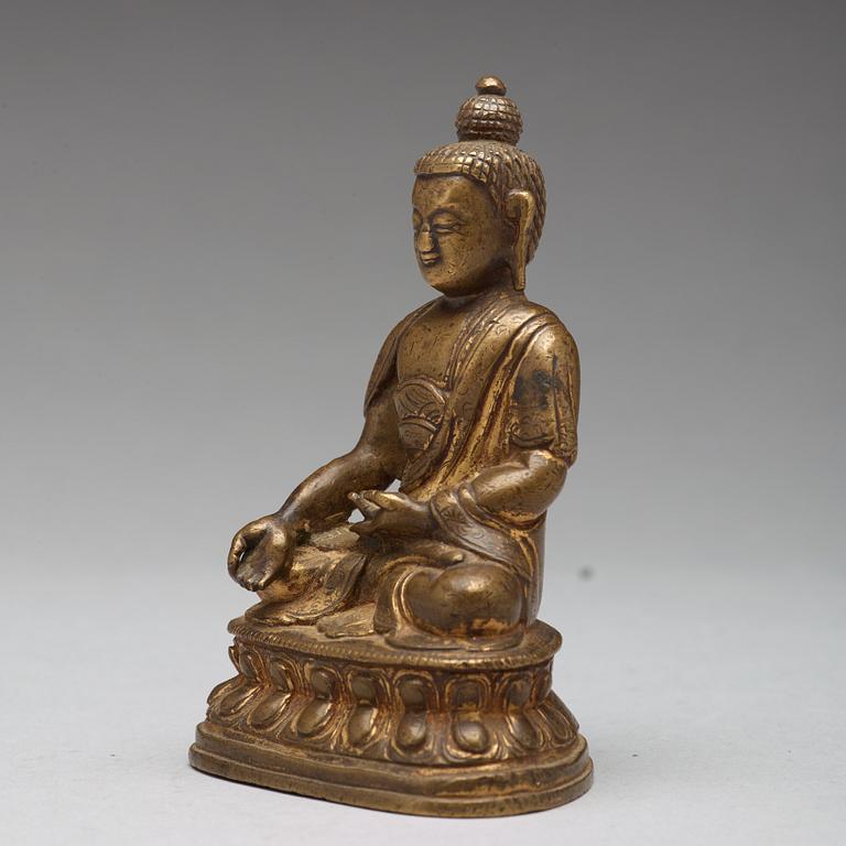 Two copper alloy figures of buddha, Sino-Tibetan, circa 1900.