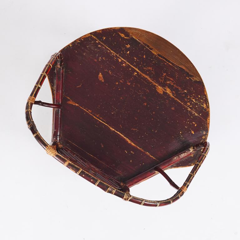 A Chinese bamboo horseshoeback armchair, late Qing dynasty.