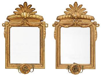 A matched pair of Gustavian three-light girandole mirrors, by N. Sundström.