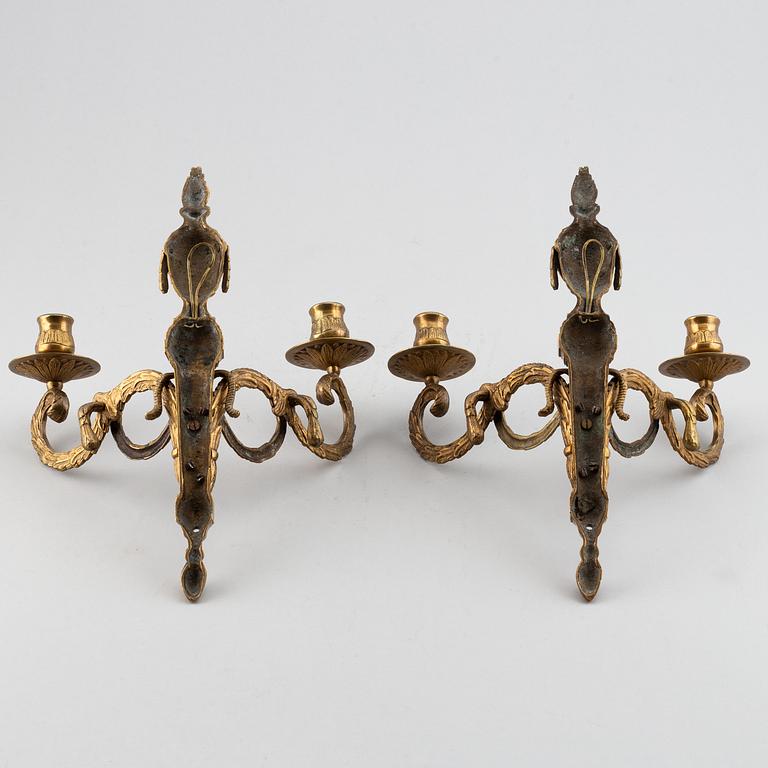 A 20th Century pair of Louis XVI style wall sconces, for two candles.