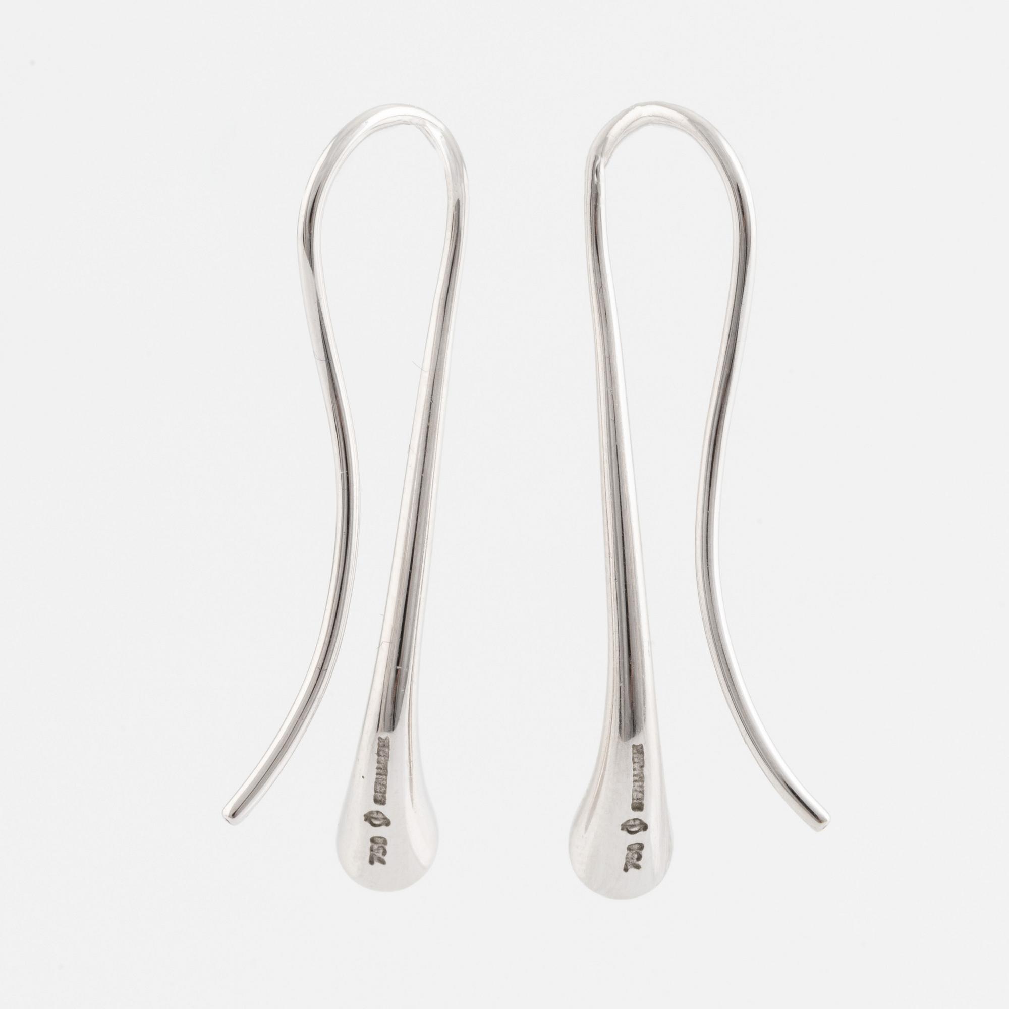 A pair of Georg Jensen 18K white gold earrings set with round brilliant-cut diamonds.