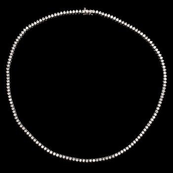 Kaulakoru, 18K valkokultaa ja briljanttihiottuja timantteja.